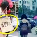 女子僅穿內衣褲在街頭舉牌,看到牌子上4個大字,網友:現代版「賣身葬父」?