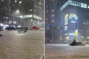 首爾大暴雨「馬路變河道」！公車遭滅頂　西裝男慘困轎車孤島