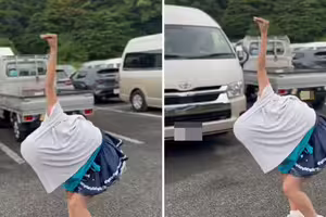 正妹在停車場「學鴕鳥」　上衣掀開真面目美呆！14秒片瘋傳