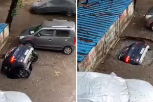 汽車突然「消失」　掉入坑中慘遭淹沒