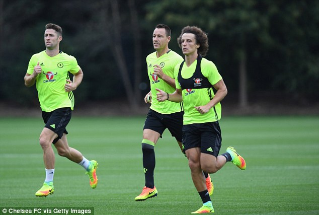 37FA8A4500000578-0-David_Luiz_right_is_put_through_his_paces_as_he_prepares_to_make-a-10_1473342001826.jpg