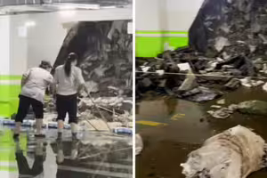 暴雨沖破中國車庫牆 住戶見一幕氣炸了 暴雨沖破中國車庫牆 住戶見一幕氣炸了