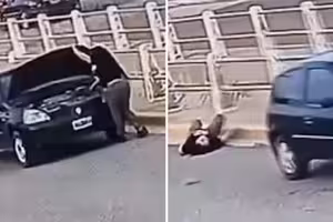 女子路邊修車一半 車輛突暴衝輾過全身 女子路邊修車一半 車輛突暴衝輾過全身