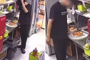 店員低頭狂搓「頭皮屑」 撒披薩上調味慘了 店員低頭狂搓「頭皮屑」 撒披薩上調味慘了
