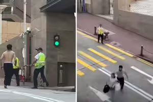 男子大街上揮刀追砍　婦人中刀！保全拚命救人