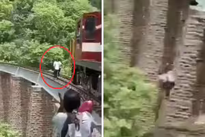 夫妻為拍片闖列車軌道 快被撞上急跳下高架橋 夫妻為拍片闖列車軌道 快被撞上急跳下高架橋