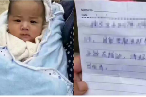 6個月大的男嬰被拋棄路邊不哭不鬧，父母卻留下了一張紙條