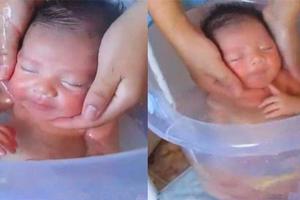 媽媽給新生兒洗澡，寶寶還以為自己沒出生，第6張表情絕了！太可愛~